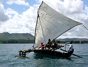 Canoe sailing.